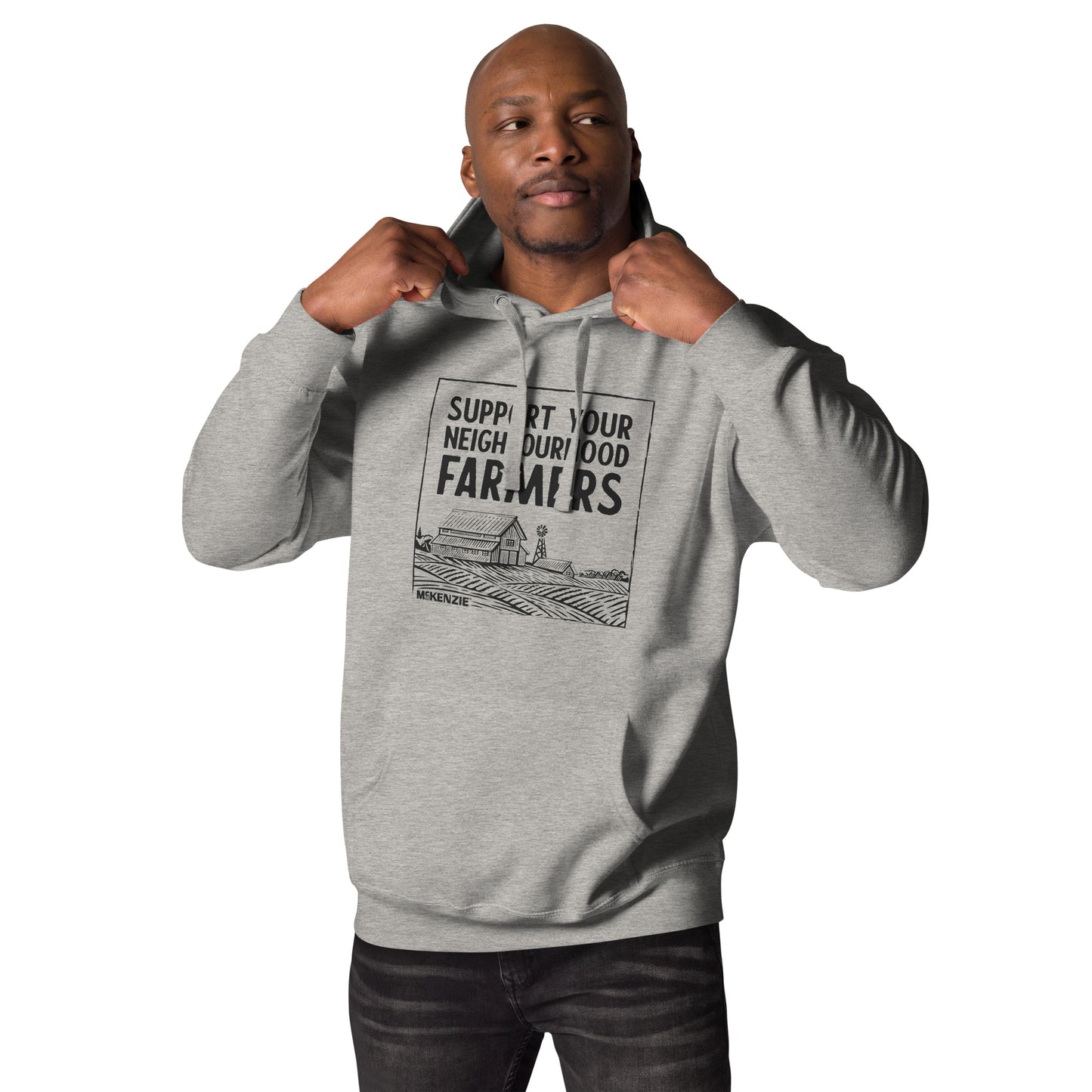 Man wearing a gray hoodie with text and graphic design on a white background
