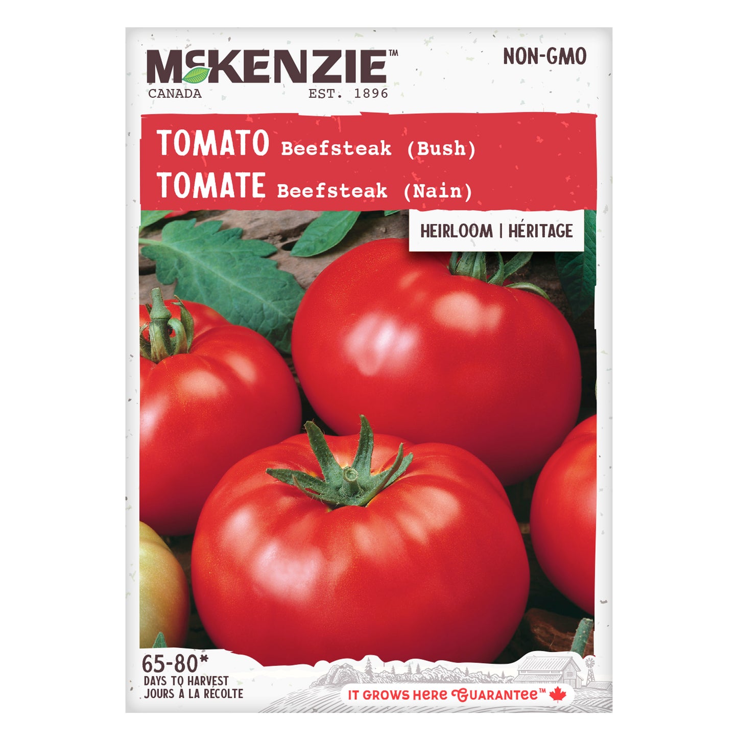 Front of McKenzie Seeds tomato seed packet showing ripe red tomatoes