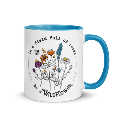 "In A Field Full Of Roses, Be A Wildflower" Mug Blue Gif
