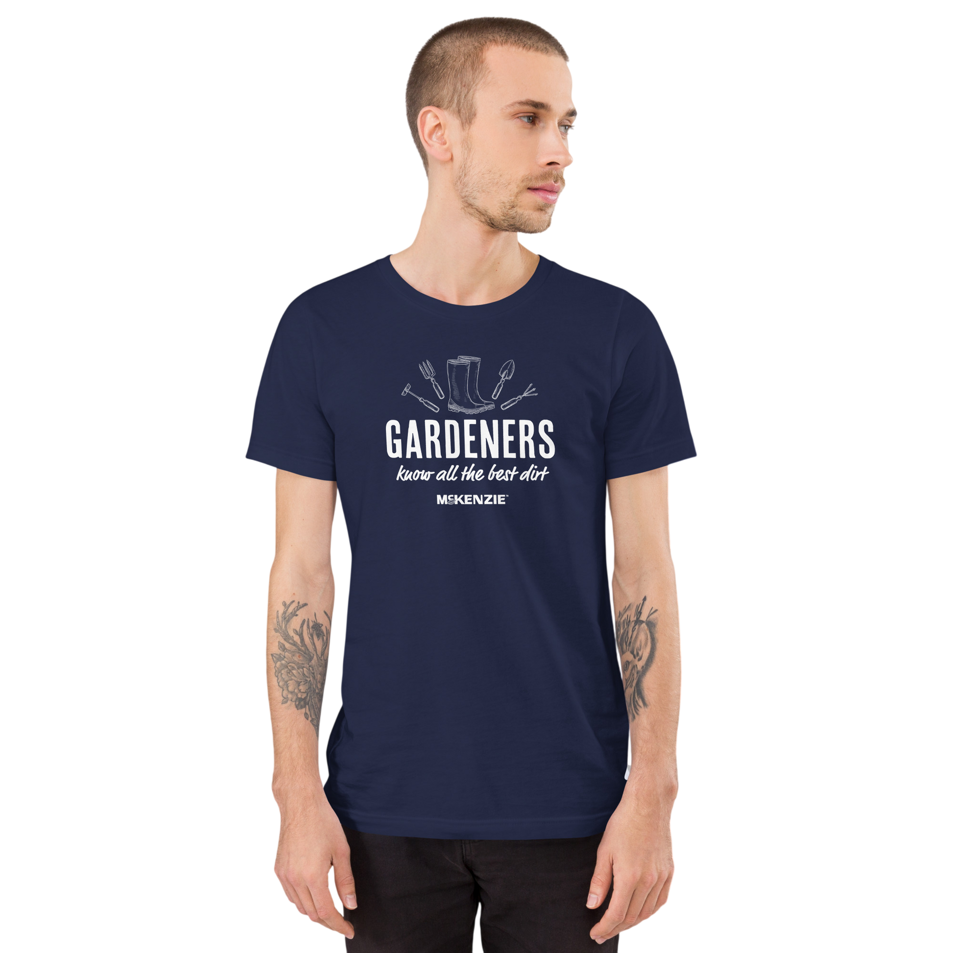 A man wearing a navy blue crewneck t-shirt with a white graphic set against a plain white background.
