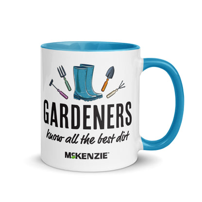 Mug with gardening-themed design and blue handle on a white background