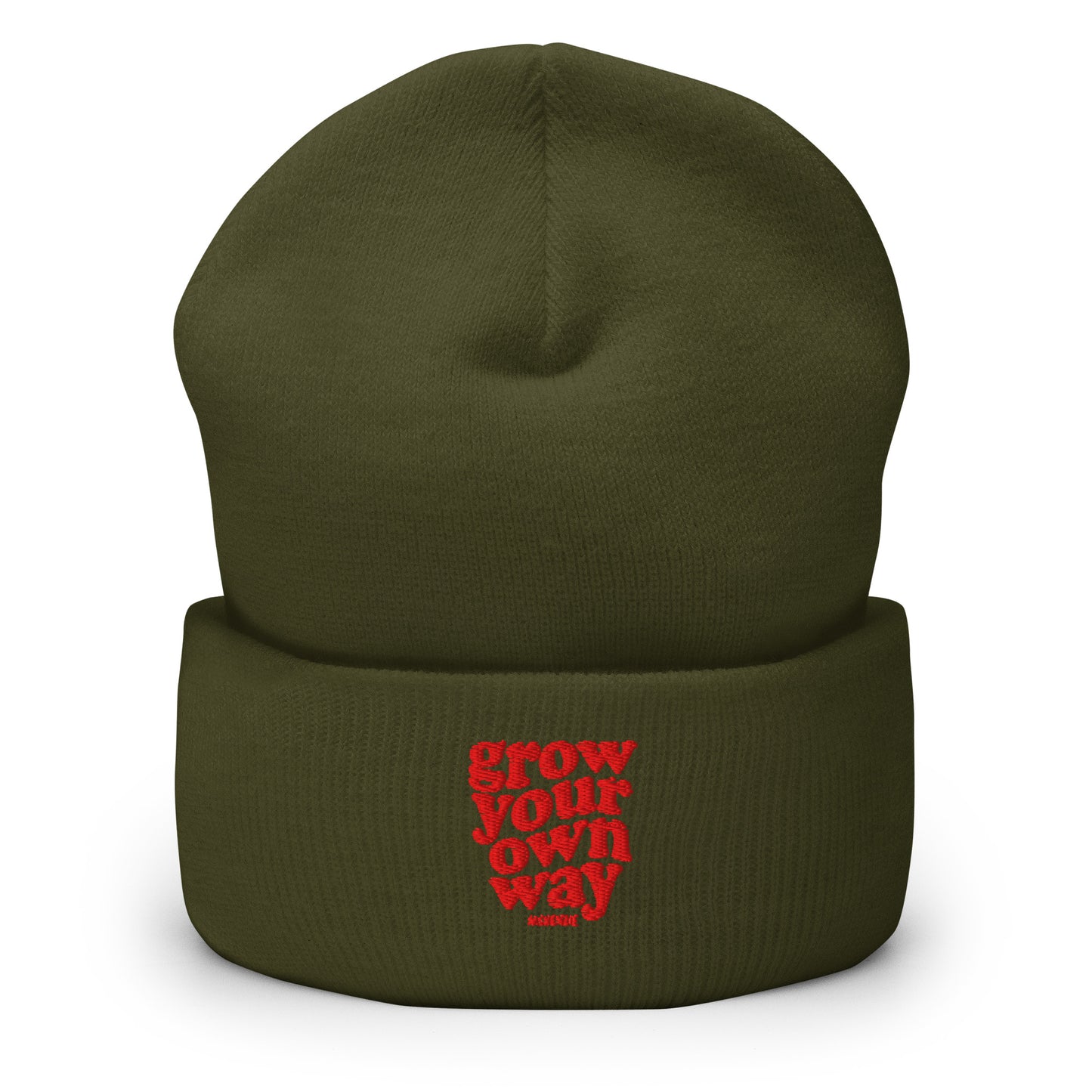 An olive green knit beanie hat with a folded cuff, featuring red embroidered text that reads 'grow your own way', shown on a plain white background.