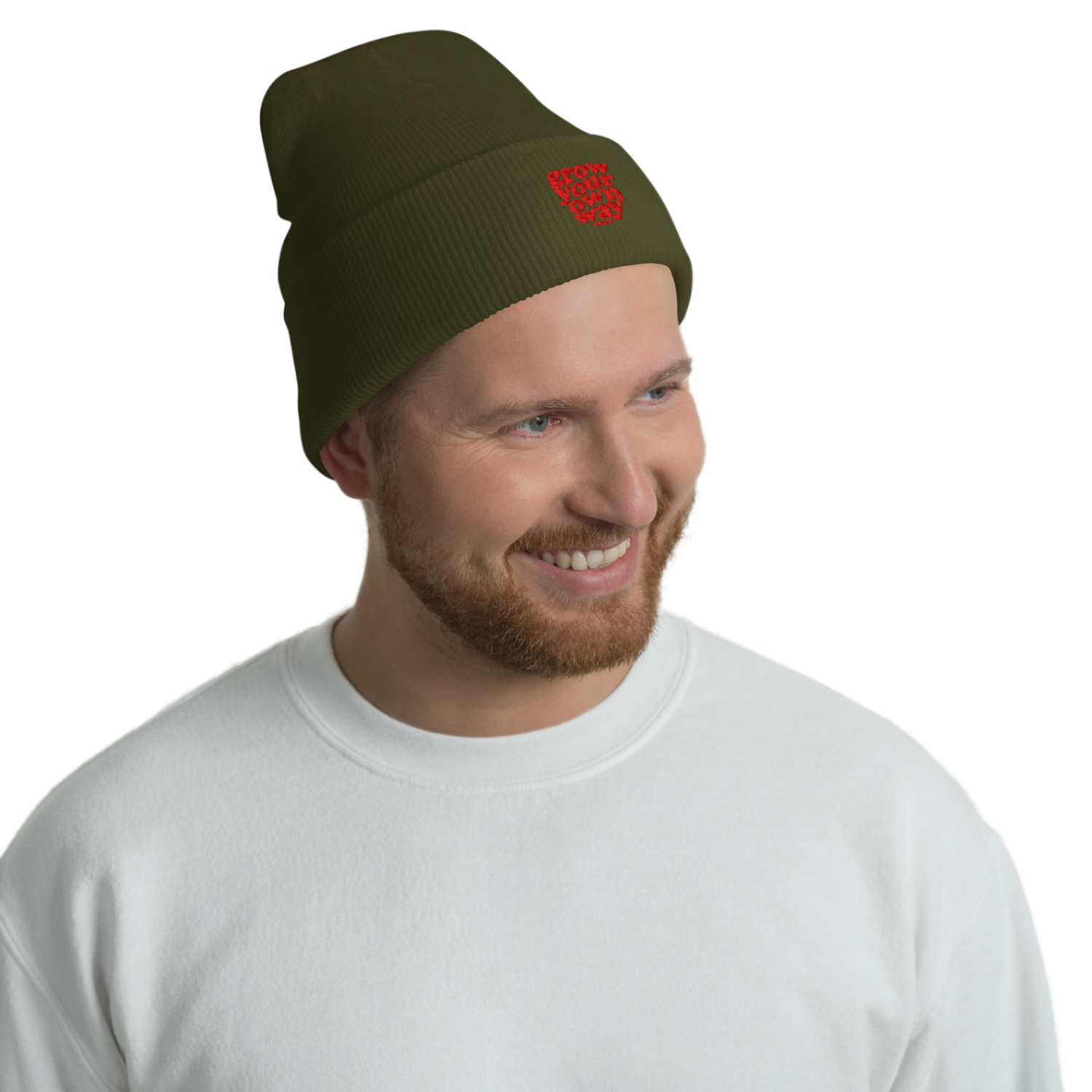 Man wearing a green beanie with a logo on a white background