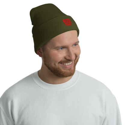 Man wearing a green beanie with a logo on a white background