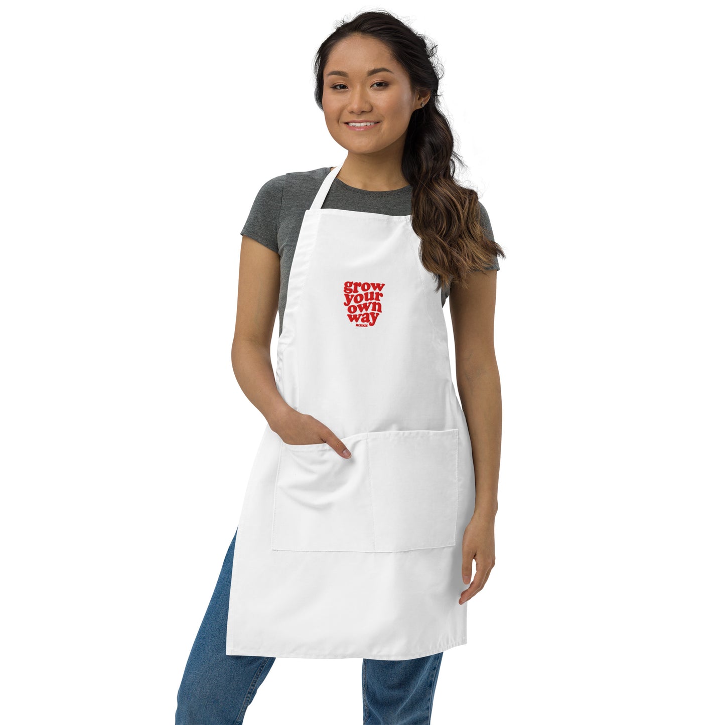 Woman wearing a white apron with text on a white background