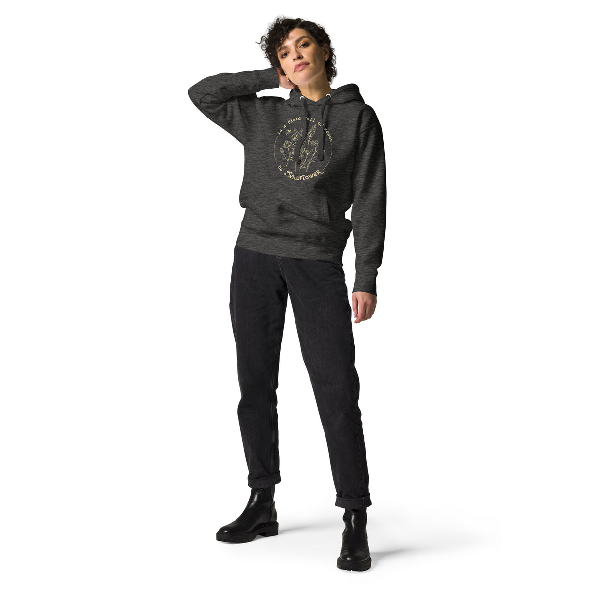 Person wearing a gray hoodie with text on a white background