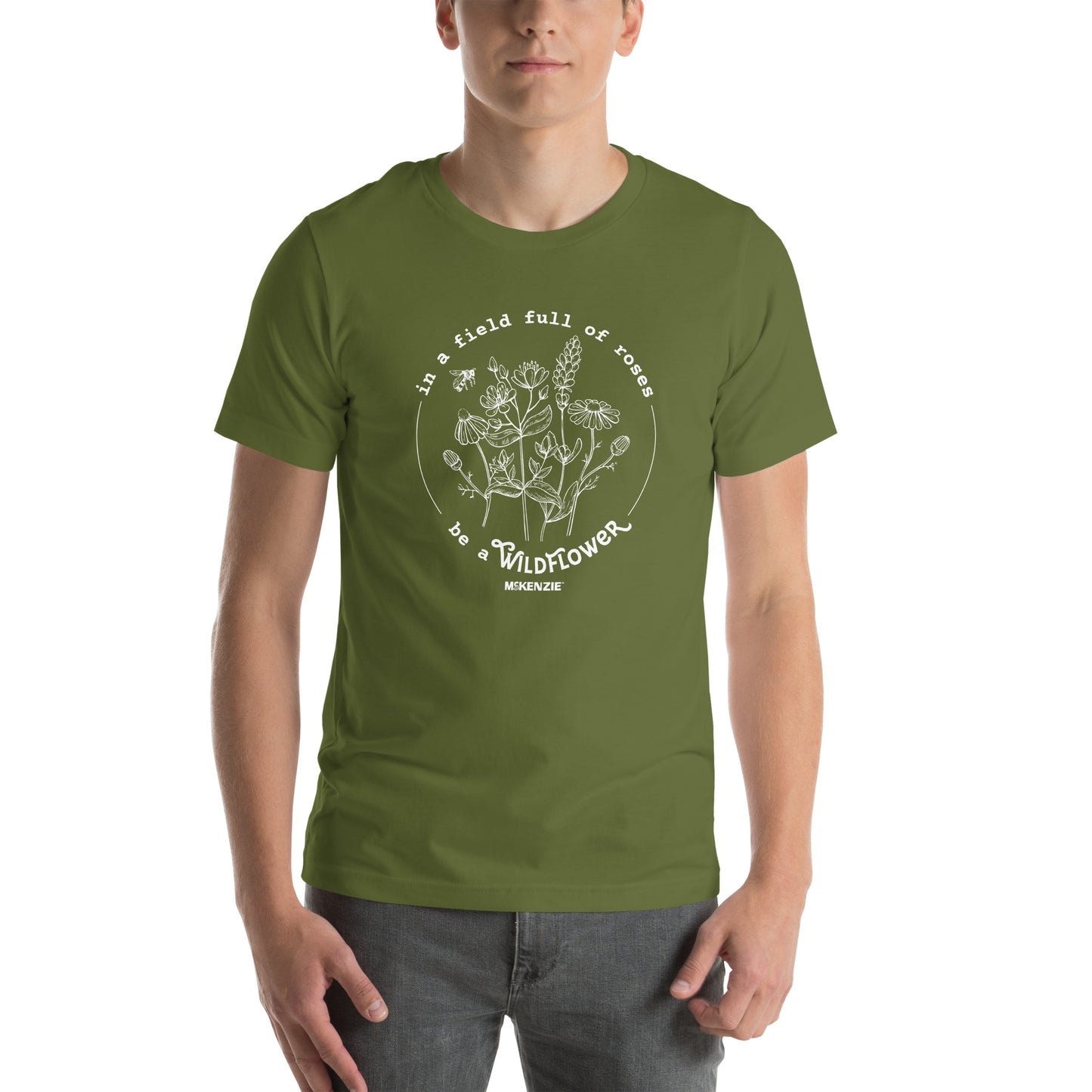 Person wearing a green t-shirt with a floral design and text on a white background