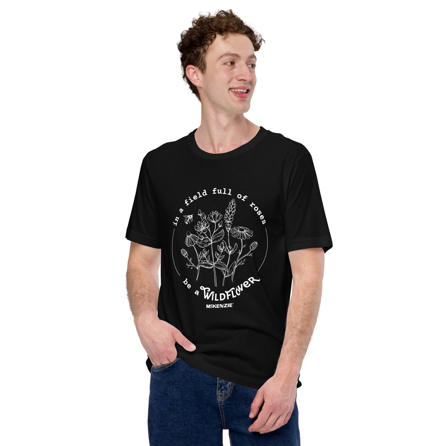 Person wearing a black t-shirt with  print on it against a white background