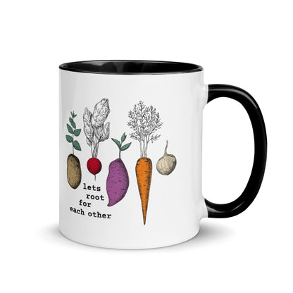 Mug with illustrations of vegetables and text 'let's root for each other' on a white background