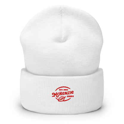 White beanie with red logo on a white background
