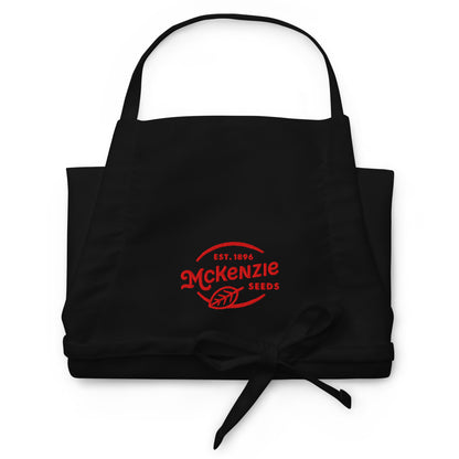 Black apron with Red text and design on a white background